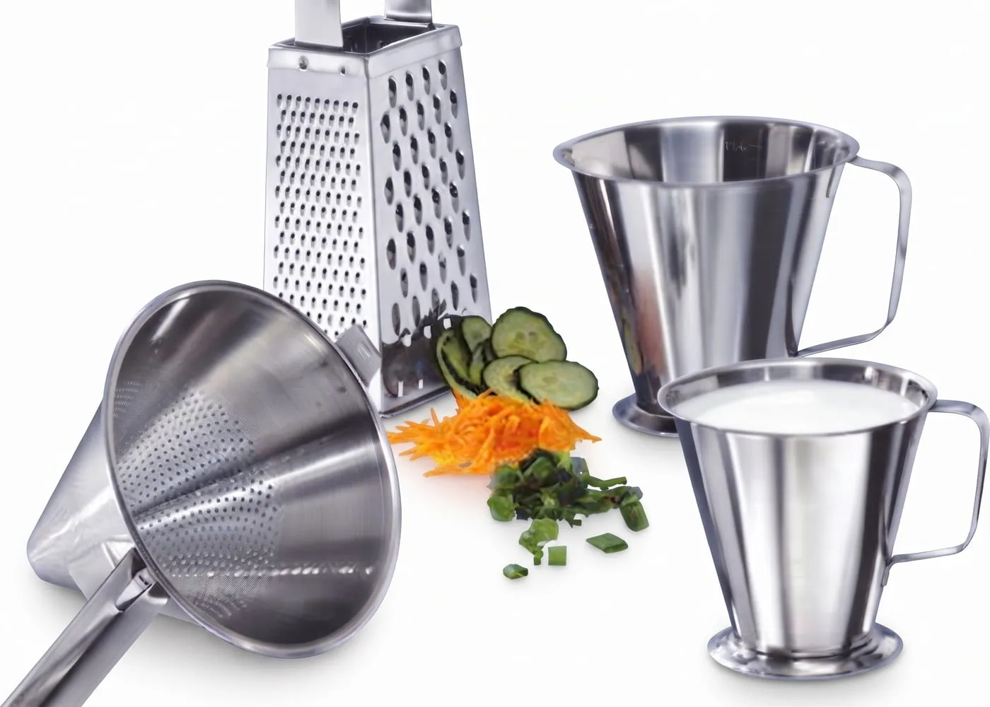 Conical strainer, box grater and stainless measuring jugs